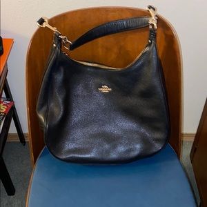 Black coach pebbled leather purse.